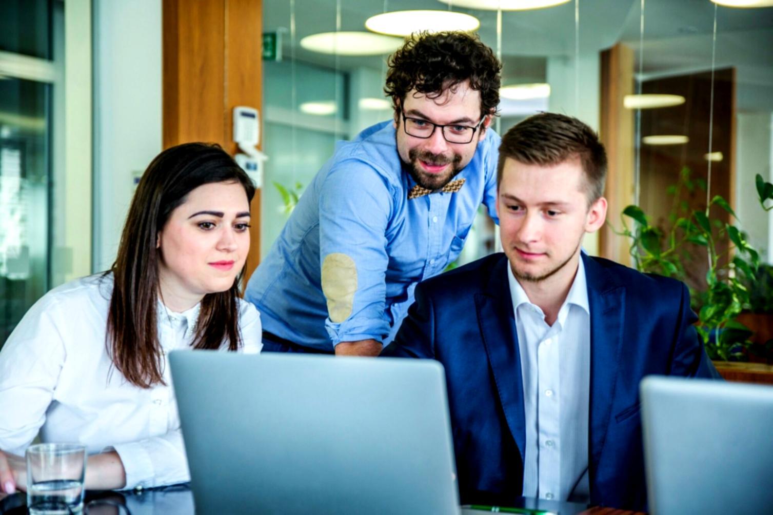 Professional reviewing financial documents and expense tracking systems